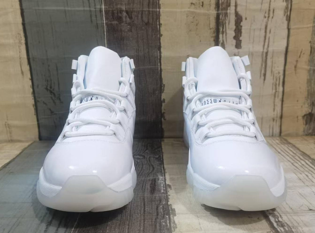 Air Jordan 11 Off-White and Black Unisex Sneakers