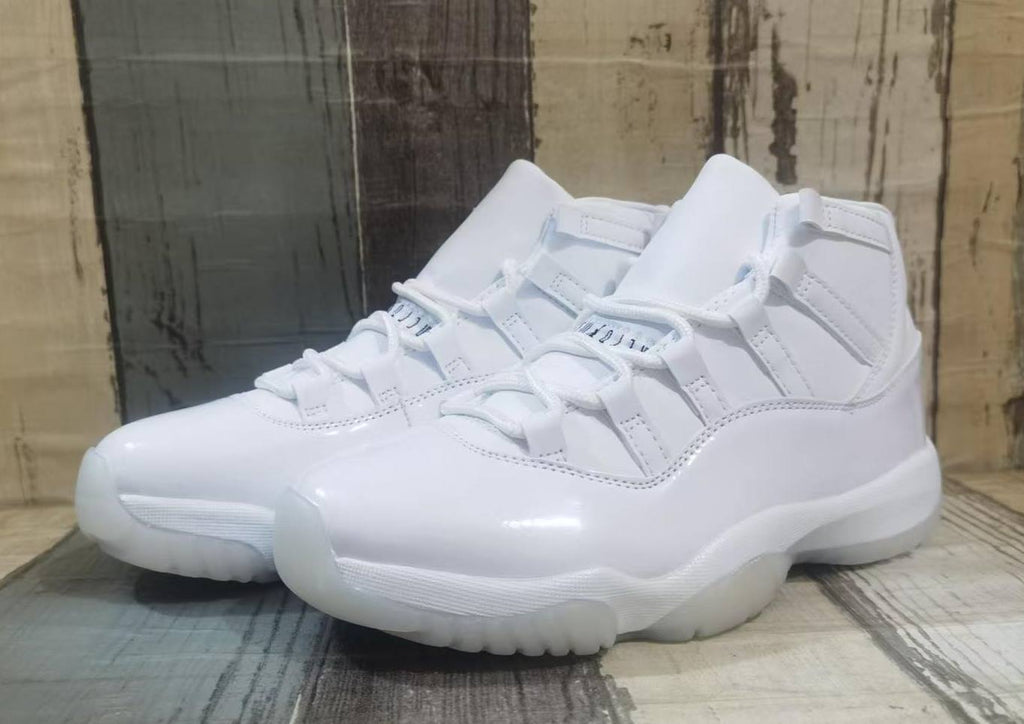 Air Jordan 11 Off-White and Black Unisex Sneakers