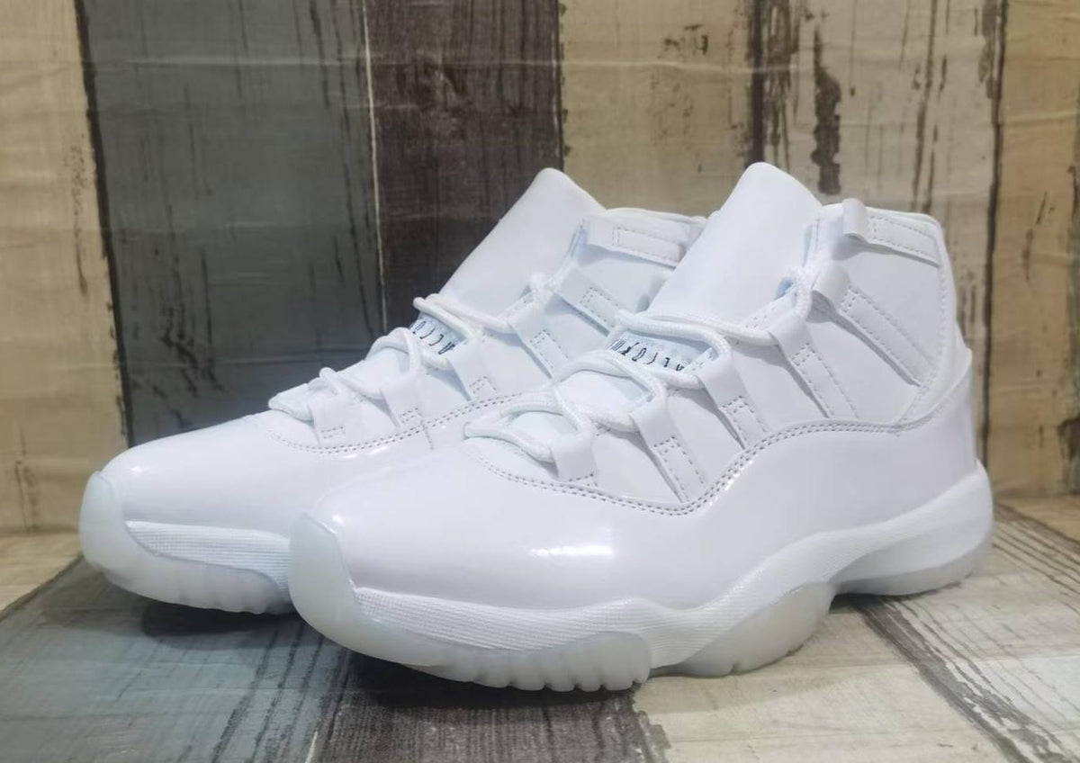 Air Jordan 11 Off-White and Black Unisex Sneakers